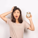 young-woman-holding-alarm-clock-white-background_54f3cfbb-b792-4355-8da3-da5e1109a5d2